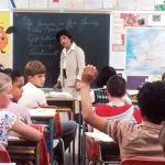 School Classroom - Is living near a school good or bad idea - Should You Buy small